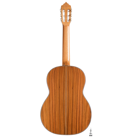 The back of a 2021 Gerundino Fernandez Hijo &quot;Negra&quot; flamenco guitar made with spruce and pau ferro on a white background
