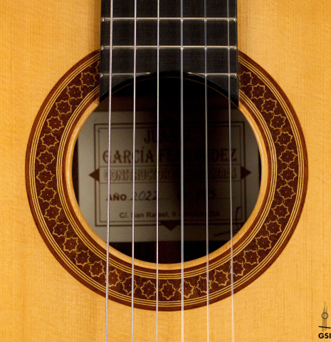 The rosette of a 2022 Juan Garcia Fernandez classical guitar made with spruce top and cocobolo back and sides