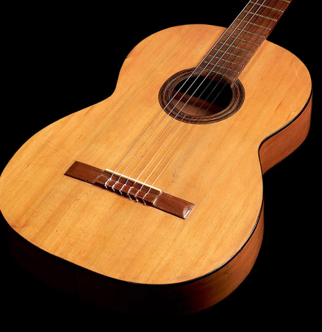 The soundboard of a 1891 Benito Ferrer historical classical guitar made of spruce and cypress