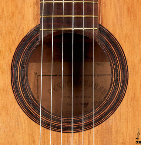 The rosette of a 1891 Benito Ferrer historical classical guitar