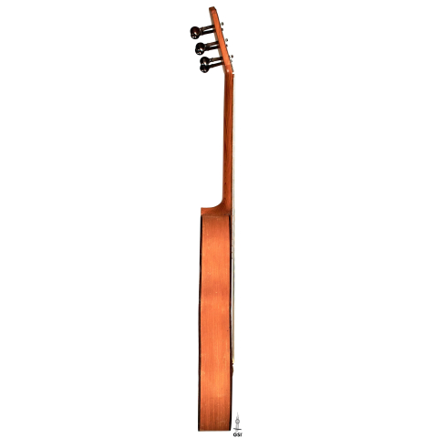 The side of a 1891 Benito Ferrer historical classical guitar