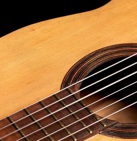 The rosette and fretboard of a 1891 Benito Ferrer historical classical guitar