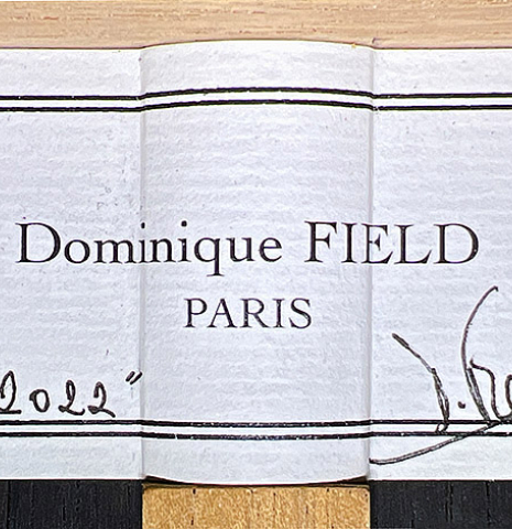 The label of a 2022 Dominique Field classical guitar made with spruce and CSA rosewood