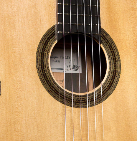 The soundboard of a 2022 Dominique Field classical guitar made with spruce and CSA rosewood