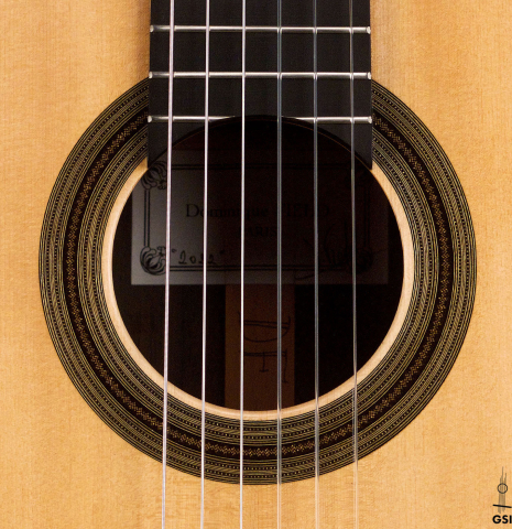 The rosette of a 2022 Dominique Field classical guitar made with spruce and CSA rosewood
