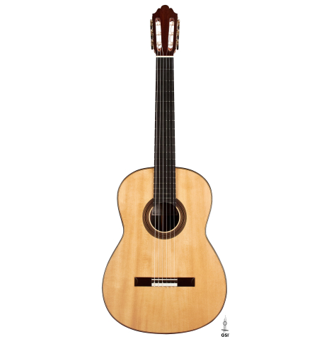 The front of a 2023 Dominique Field classical guitar made with spruce and CSA rosewood on a white background