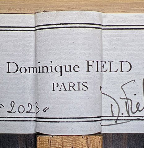 The label of a 2023 Dominique Field classical guitar made with spruce and CSA rosewood