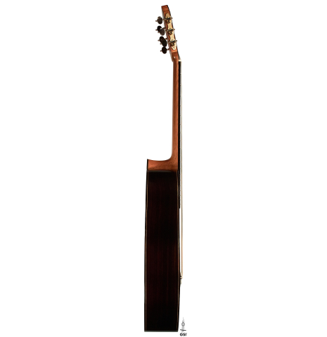 The side of a 2023 Dominique Field classical guitar made with spruce and CSA rosewood on a white background