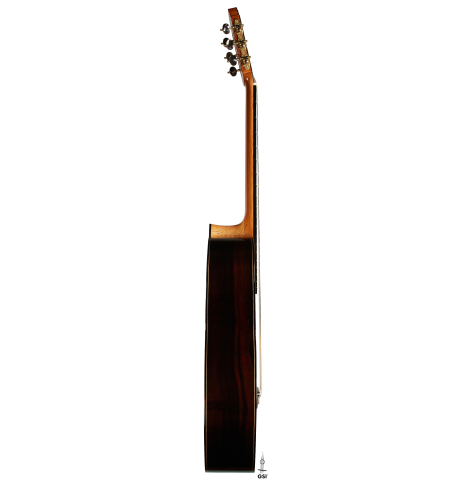 The side of a 2025 Dominique Field classical guitar made of spruce and CSA rosewood