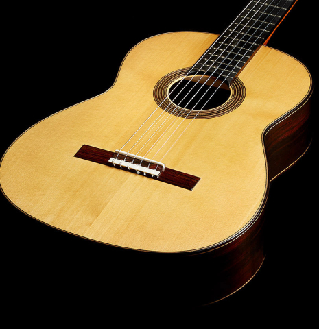 The soundboard of a 2025 Dominique Field classical guitar made of spruce and CSA rosewood