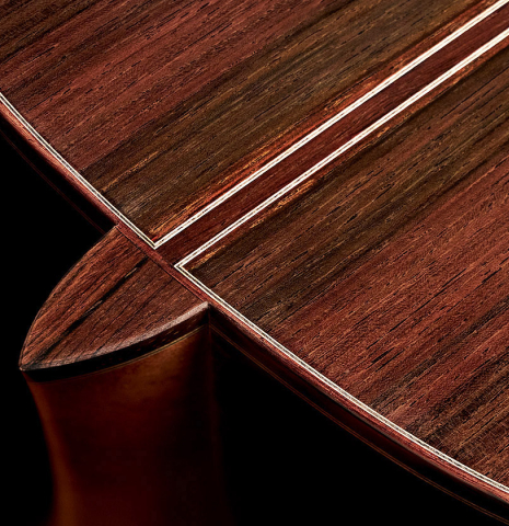 The heel of a 2005 Dominique Field classical guitar made of spruce and CSA rosewood