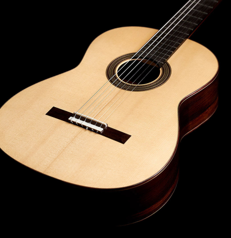 The front of a 2005 Dominique Field classical guitar made of spruce and CSA rosewood