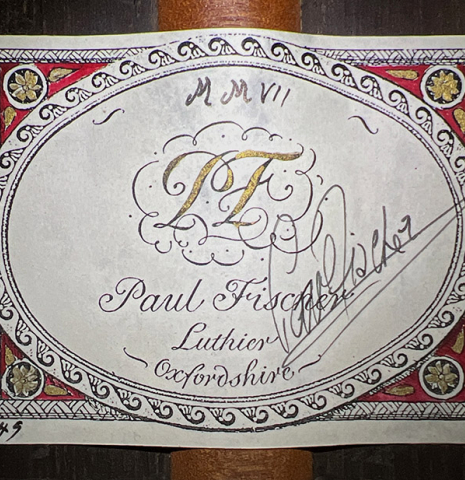 The label of a 2007 Paul Fischer "Premier Taut" classical guitar made with spruce and CSA rosewood.
