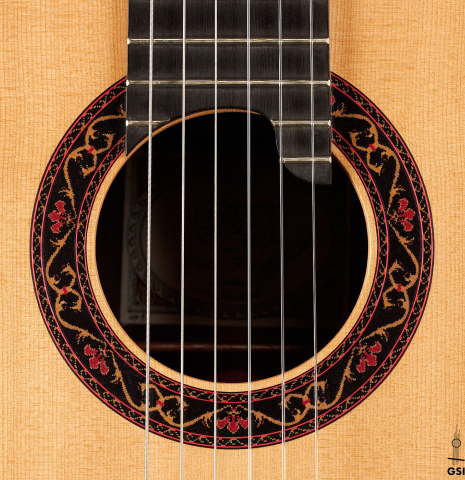 The rosette of a 2007 Paul Fischer "Premier Taut" classical guitar made with spruce and CSA rosewood.