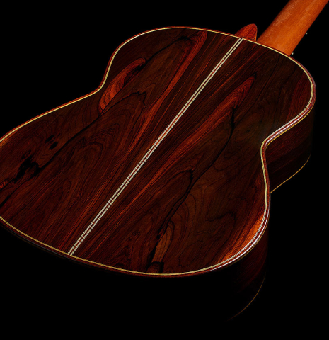 The back and sides of a 1990 Paul Fischer "Virtuoso" classical guitar made of spruce and CSA rosewood