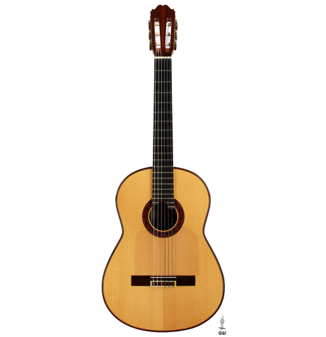 The front of a 1990 Paul Fischer "Virtuoso" classical guitar made of spruce and CSA rosewood