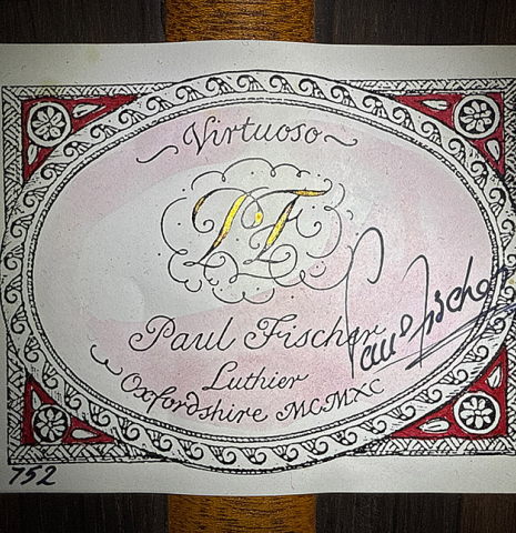 The label of a 1990 Paul Fischer "Virtuoso" classical guitar made of spruce and CSA rosewood