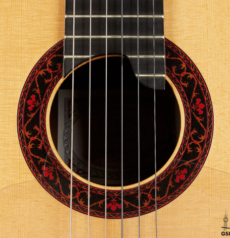 The rosette of a 1990 Paul Fischer "Virtuoso" classical guitar made of spruce and CSA rosewood