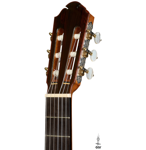 The headstock of a 2008 Paul Fischer "Premier" classical guitar made of cedar and CSA rosewood