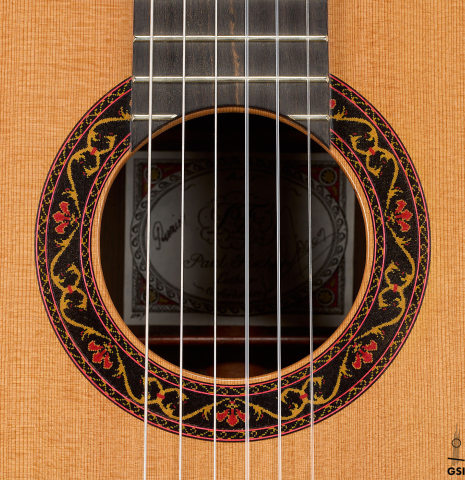 The rosette of a 2008 Paul Fischer "Premier" classical guitar made of cedar and CSA rosewood