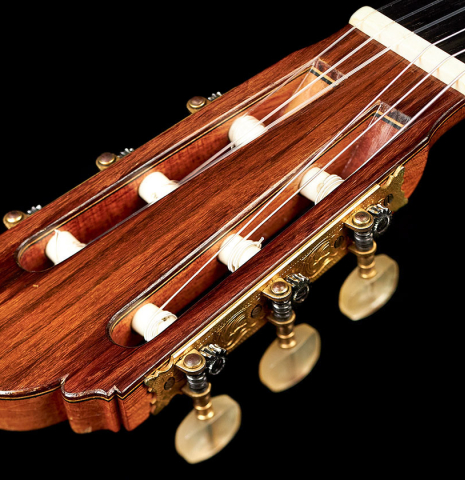 The headstock of a 1972 Ignacio Fleta classical guitar made of cedar and Indian rosewood
