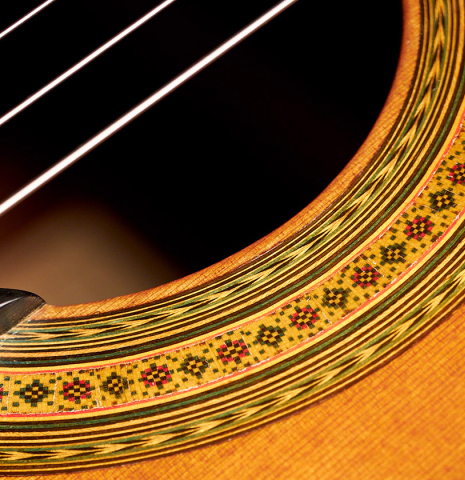 The rosette of a 1972 Ignacio Fleta classical guitar made of cedar and Indian rosewood