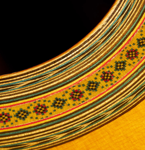 Closeup detail of the rosette of a 1966 Ignacio Fleta classical guitar made of spruce and CSA rosewood