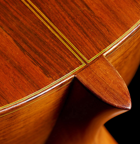The heel, neck joint, back bindins and purflings of a 1960 Ignacio Fleta classical guitar made of spruce and CSA rosewood
