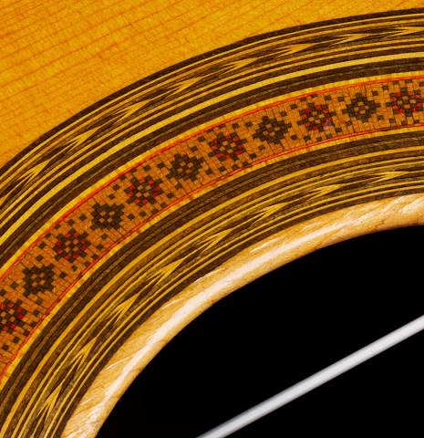 Detailed close-up of the rosette of a 1960 Ignacio Fleta classical guitar made of spruce and CSA rosewood