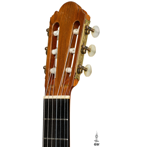 The headstock of a 1965 Ignacio Fleta classical guitar made of spruce and Indian rosewood