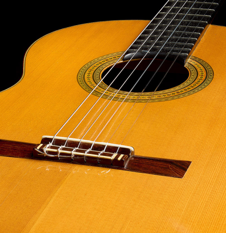 The soundboard of a 1965 Ignacio Fleta classical guitar made of spruce and Indian rosewood