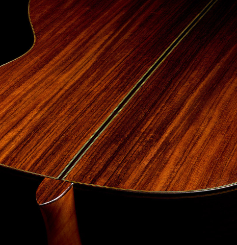 The heel, back binding and purfling of a 1960 Ignacio Fleta classical guitar made of spruce and Indian rosewood