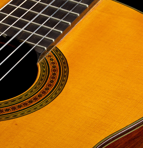 The soundboard and rosette of a 1960 Ignacio Fleta classical guitar made of spruce and Indian rosewood