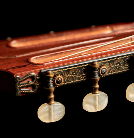 The headstock and machine heads of a 1965 Daniel Friederich classical guitar made of spruce and CSA rosewood