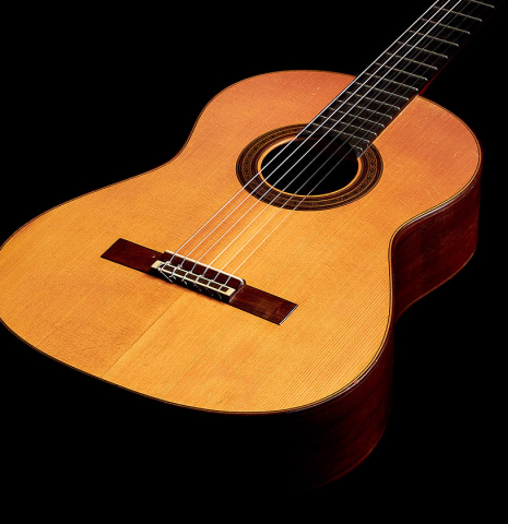 The front of a 1965 Daniel Friederich classical guitar made of spruce and CSA rosewood