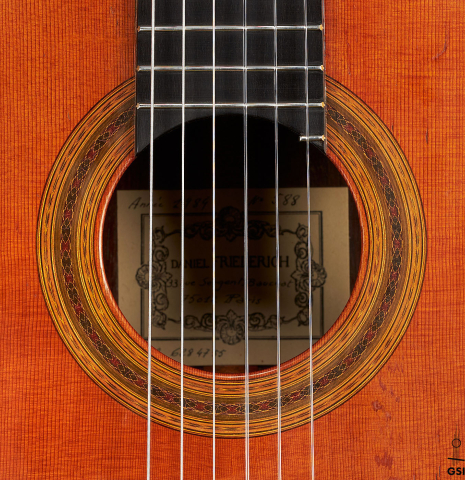 The rosette of a 1984 Daniel Friederich classical guitar made of cedar and Indian rosewood.