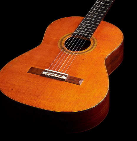 The soundboard of a 1984 Daniel Friederich classical guitar made of cedar and Indian rosewood.