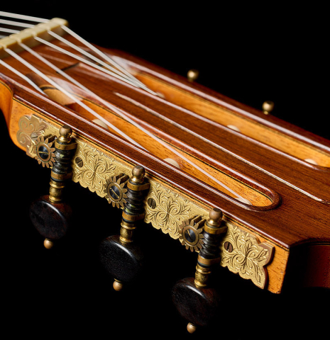 The headstock and tuning machines of a 1988 Daniel Friederich (ex Roberto Aussel) classical guitar made of cedar and Indian rosewood.