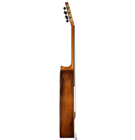 The side of a 1988 Daniel Friederich (ex Roberto Aussel) classical guitar made of cedar and Indian rosewood.