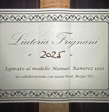 The label of a 2025 Liuteria Frignani "1910 Manuel Ramirez" classical guitar made of spruce and Indian rosewood