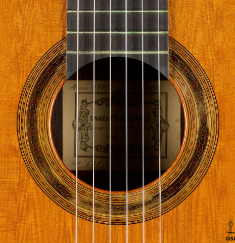 The rosette of a 1975 Daniel Friederich classical guitar made of cedar and Indian rosewood
