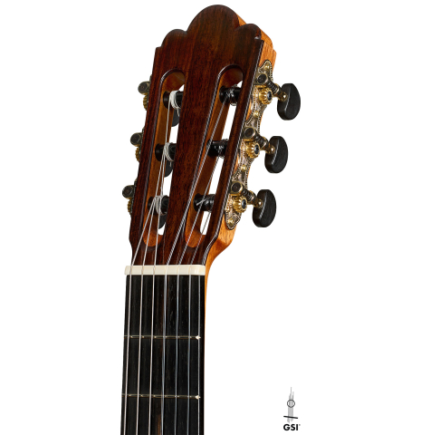 The headstock of a 2025 Liuteria Frignani "1915 Enrique Garcia" classical guitar made of spruce and Indian rosewood