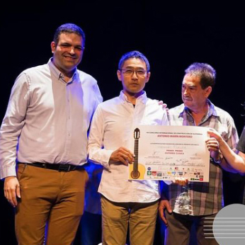 Hironori Fukuda being awarded first prize by Vicente Coves and Jose Marin Plazuelo