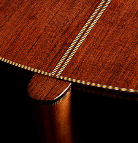 The heel, back binding and purflings of a 2024 Hironori Fukuda classical guitar made of spruce and African rosewood