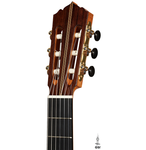 The headstock of a 2024 Hironori Fukuda classical guitar made of spruce and African rosewood