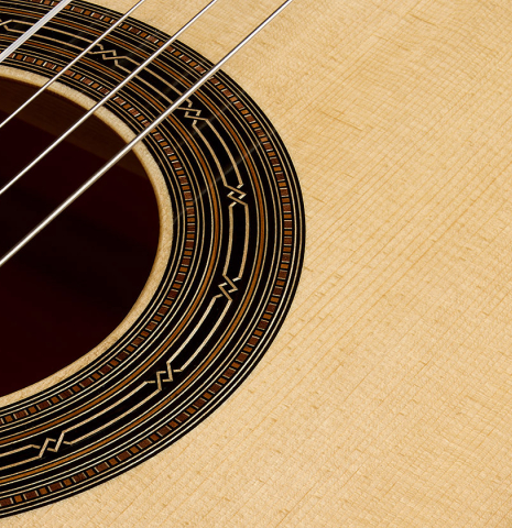 The soundboard and rosette of a 2026 Hironori Fukuda classical guitar made of spruce and maple