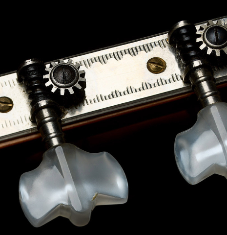 The tuning machines of a 1968 Pietro Gallinotti classical guitar made of spruce and cherry