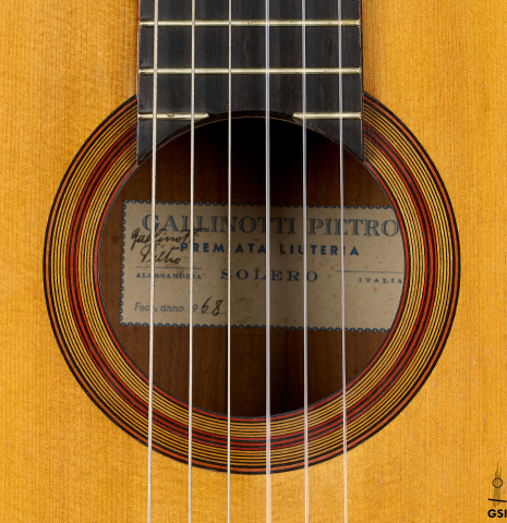 The rosette of a 1968 Pietro Gallinotti classical guitar made of spruce and cherry