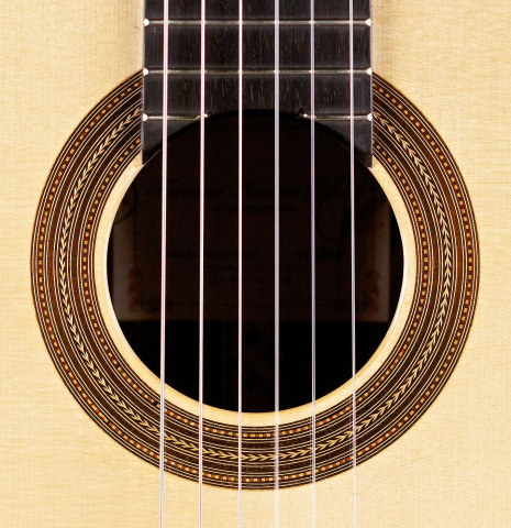 The rosette of a 2014 Francisco Navarro Garcia "Hauser" classical guitar made with spruce and cocobolo