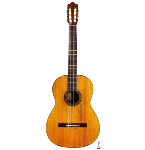The front of a 1903 Enrique Garcia classical guitar made of spruce and mahogany
